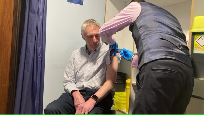 man receiving vaccine
