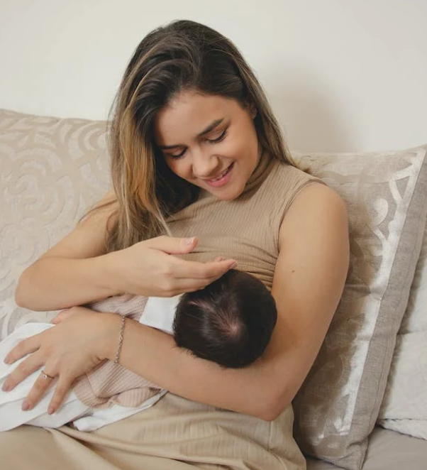 Woman breastfeeding baby